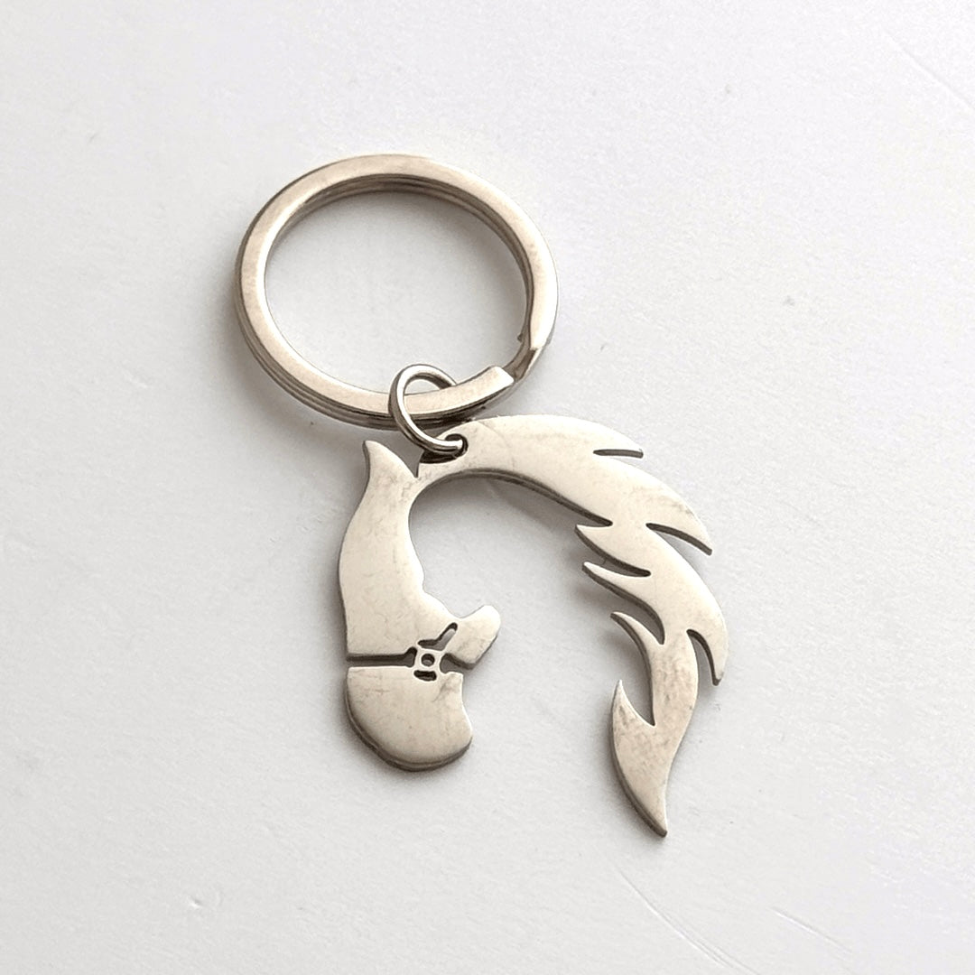 Llavero caballo y mujer